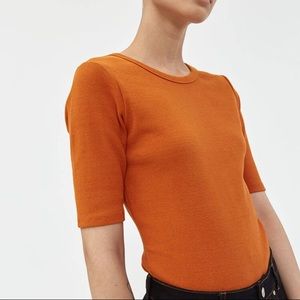 NEED | Rust body suit